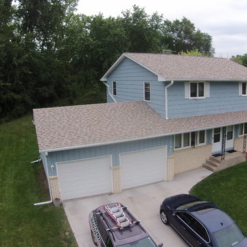 New Owens Corning "Amber" color asphalt shingle roof.