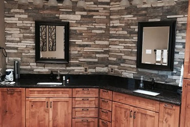 Mid-sized elegant master beige tile, brown tile and ceramic tile ceramic tile bathroom photo in Austin with shaker cabinets, dark wood cabinets, a one-piece toilet, gray walls, an undermount sink and granite countertops