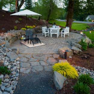 Flagstone And River Rock Patio - all in one patio design