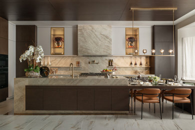 Example of a huge trendy l-shaped porcelain tile, beige floor and wood ceiling kitchen design in Houston with an integrated sink, flat-panel cabinets, dark wood cabinets, quartzite countertops, beige backsplash, paneled appliances, an island and beige countertops