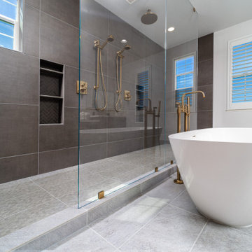 Elegant master bathroom with large format tile