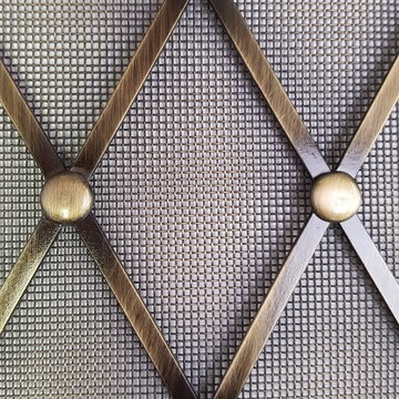 Custom formed #403 style Wire Grille with rosettes and mesh backing