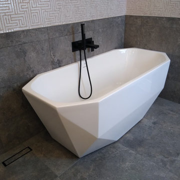 Freestanding Tub Installed Against Wall