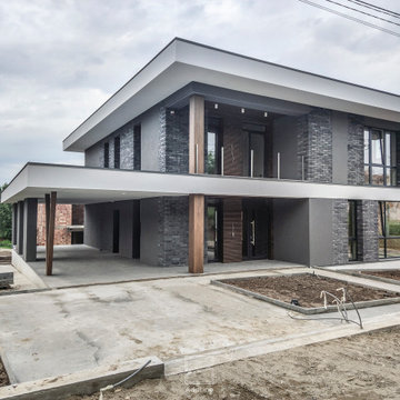 Modern two-story house with a terrace