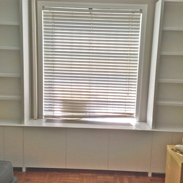 radiator cover with cabinets and bookcases