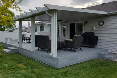 Inspiration for a mid-sized contemporary backyard deck remodel in Salt Lake City