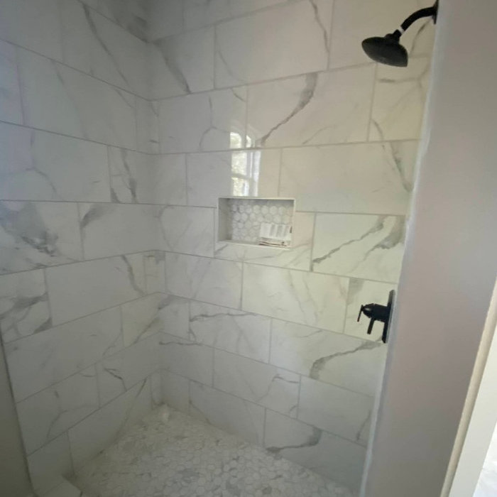 Bathroom remodel in Raleigh, NC by Apal Building Company – expert craftsmanship and quality design for a beautiful, functional space.