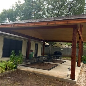 Rough cedar pergola with tongue and groove ceiling