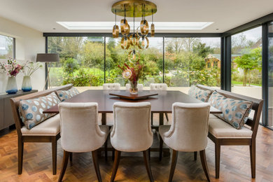 Photo of a large traditional dining room in Sussex.