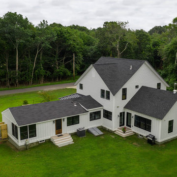 Modern Farmhouse with Cross Gable Roof 1st Floor master suite and great room