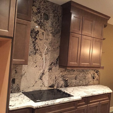 Full height backsplash.. Delicates Granite