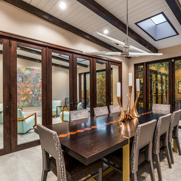 Interior Bi-Fold Doors Separate Formal Sitting Room from Dining Room