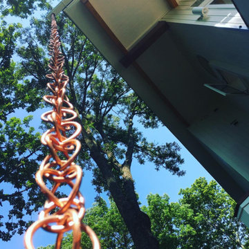 Rain chain from top of the roof to the ground