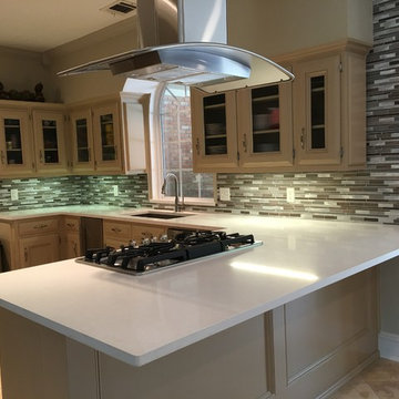 Kitchen with extended backsplash