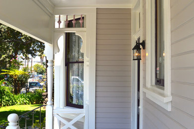 Victorian two-story wood exterior home idea in Los Angeles