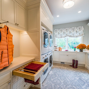 Photo of a classic separated utility room in Cleveland with beaded cabinets, white cabinets, grey walls and white worktops.