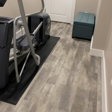 Lower Level Remodel With Home Bar, Spa-like Suite, Craft Room , and Home Gym