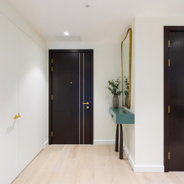The modern aesthetic of the apartment is evident from the outset as seen in the