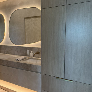 Custom Floating Vanity with Backlit Organic Mirrors