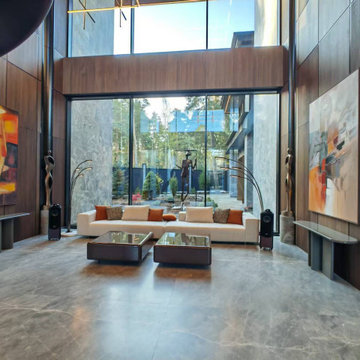 Double-height Entrance Lobby with Wood & Marble Spliced Wall
