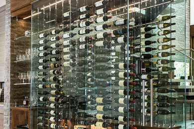 Contemporary Under-the-Stairs Wine Cellar with The Cable Wine System
