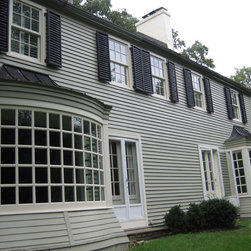 White SDLs Add Impact to Traditional Lap Siding - Windows