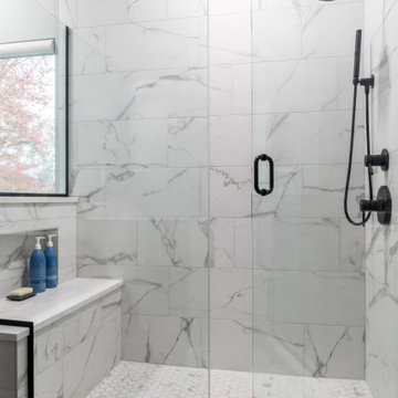 A curated bathroom with clever storage and intricate, artful design