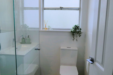Photo of a modern home design in Melbourne.