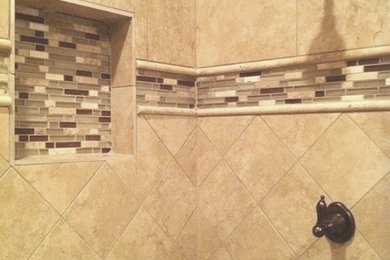 Inspiration for a contemporary beige tile and porcelain tile bathroom remodel in Little Rock