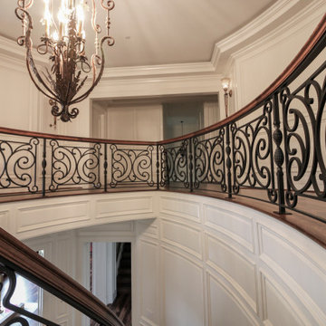 Project #74 | Circular Staircase with Hand-Forged Metal Panels