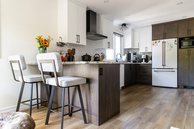 Example of a trendy kitchen design in Calgary