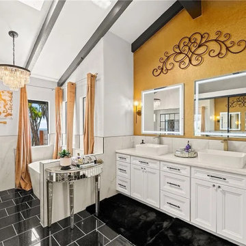 Luxury Master Bathroom with Double Vanity and Gold Accent Wall