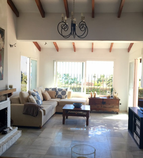 Are blinds possible for windows with handles in Spanish villa?