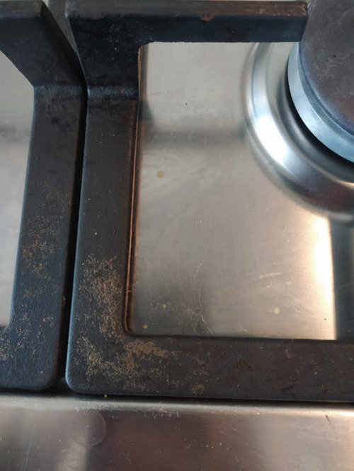 Clean orange discoloration on cast iron stove grates?
