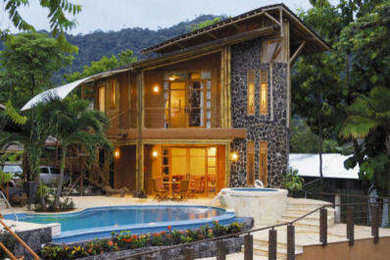 Inspiration for a tropical home design remodel in Other