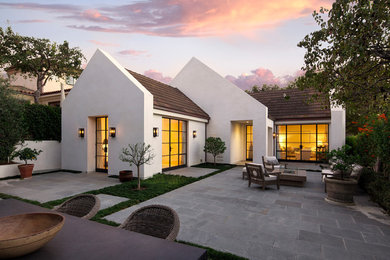 Inspiration for a transitional white gable roof remodel in Santa Barbara