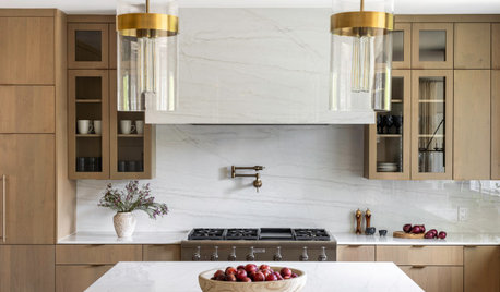 10 Kitchens With Beautiful Slab Backsplashes