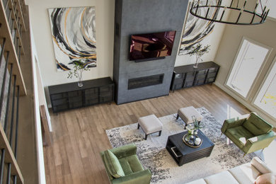 Example of a trendy formal and open concept medium tone wood floor living room design in Other with white walls, a ribbon fireplace, a tile fireplace and a wall-mounted tv