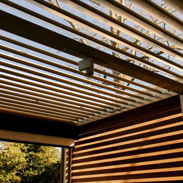 Residential: Custom Pergola Protection For Home Golf Simulation Clubhouse