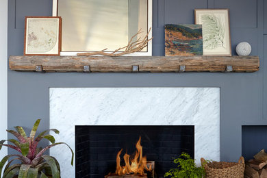 Inspiration for a mid-sized modern open concept living room remodel in San Francisco with blue walls, a standard fireplace and a stone fireplace