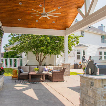 Open Gable Pool House with Fireplace and Grilling Area