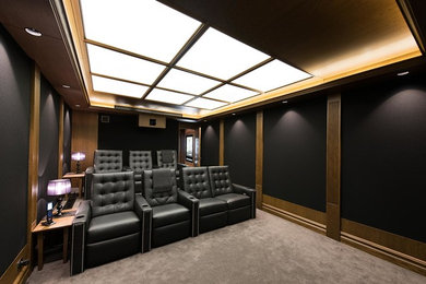 Photo of a contemporary home theatre in Sydney.