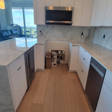 Modern Kitchen Remodel Done in New Glossy White Cabinets