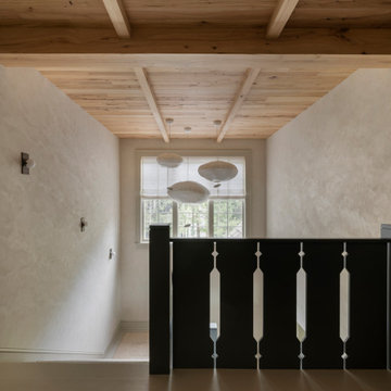 Antique Elm Paneling and Timbers Above a Wabi-Sabi Lakeside Stair Landing
