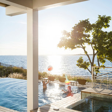seaside glass tile vanishing edge infinity swimming pool + spa