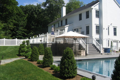 Elegant backyard deck photo in New York