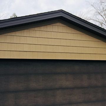 Diamond Kote siding, aluminum Dark bronze soffit and gutters