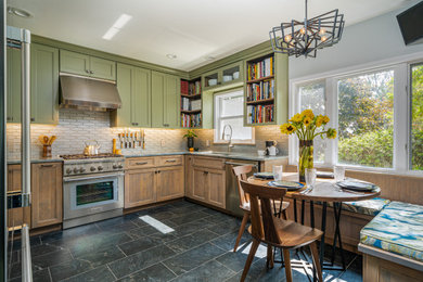 Enclosed kitchen - small transitional u-shaped porcelain tile and black floor enclosed kitchen idea in Other with a single-bowl sink, shaker cabinets, green cabinets, quartzite countertops, gray backsplash, glass tile backsplash, stainless steel appliances, no island and gray countertops