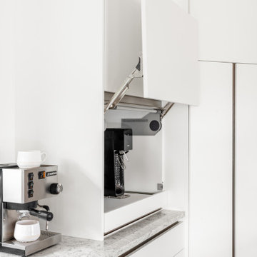 Motorized Appliance Garage with Lift-Up Door – Minimalist Kitchen Detail