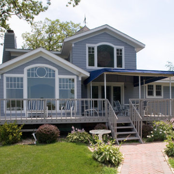 Beautiful Traditional Blue Wooden Siding Suburban Home - White Windows & Frames